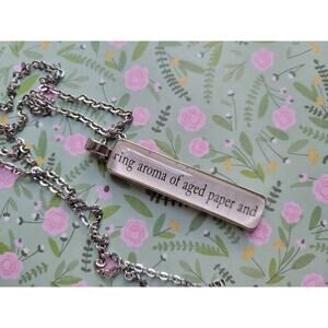 Aroma of Aged Paper pendant necklace made with Last Chance Library book pages